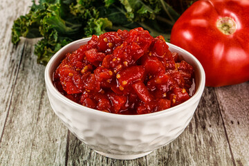 Diced ripe tomato with sauce