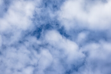 Fluffy White Clouds in a Blue Sky