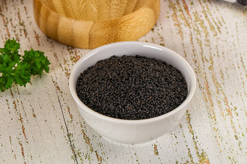 Black dry Nigella seeds in the bowl