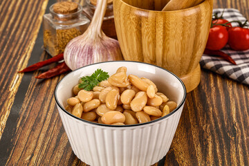 Baked white canned beans in the bowl