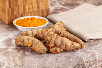 Fresh aroma tumeric roots heap