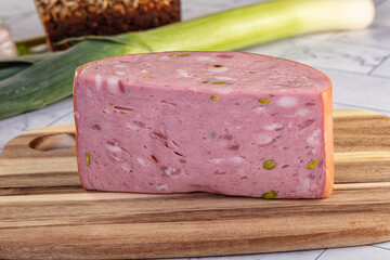Italian Mortadella pork sausage piece