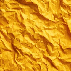 A close-up shot reveals the texture of crumpled, vibrant yellow paper.  The creases and folds create a dynamic, abstract pattern