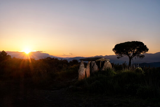 Dolmen lit during sunset
