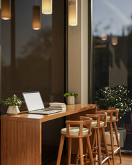 ALlaptop on wooden counter and chair with books aside at a corner with glass wall of a cafe or restaurant.