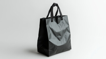 Brown paper shopping bag with handles on a black background