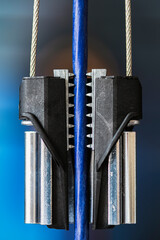 Self-locking clamp designed for suspending telecommunication and fiber optic cables with a supporting messenger wire