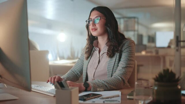 Night, business and woman with computer, glasses and online reading with research for article. Person, evening and journalist in workplace, pc and proofreading with email, internet and thinking