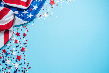 Obraz premium American flag with red white and blue stars on light blue background