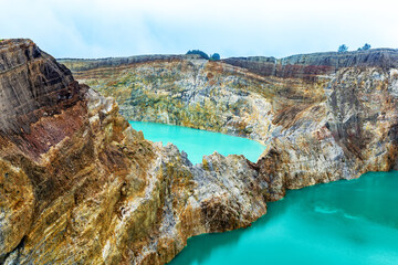 Crater lakes Danau Alapola and Kootainuamuri, Volcano Kelimutu, Island Flores, Indonesia, Southeast Asia.