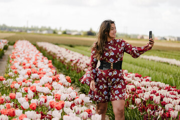Selfie Time in a Tulip Garden - content creator in a tulip field