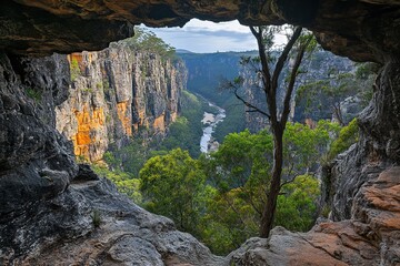 Canyon and River Landscape Seen from a Natural Rock Opening in Karijini National Park – Summer Exploration
