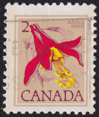 Red Columbine Aquilegia formosa flower on a 1977 Canada postage stamp