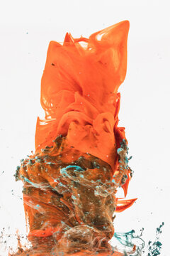 Vibrant abstract art with liquid ink creating a tornado pattern