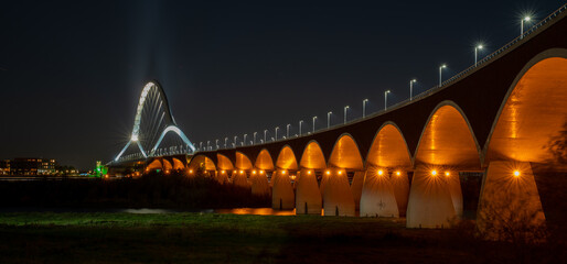Oversteek (Nijmegen)  at high water of de Waal during night.
