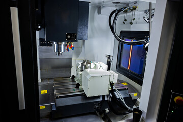 Close-up View of a Modern CNC Milling Machine Equipped for High-Precision Metalwork