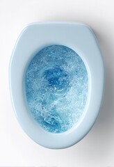 Light-blue toilet bowl, water swirling