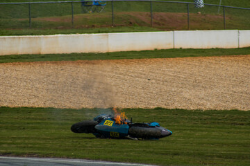 blue motorcycle on fire