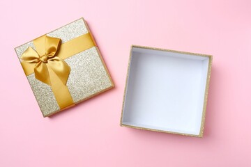 Open gift box on color background, top view