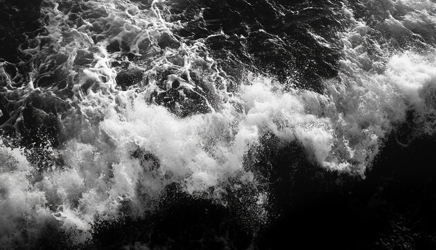 foamy waves rolling up in ocean