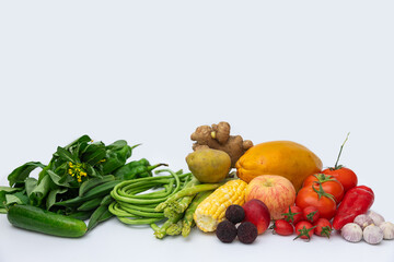 Fresh fruits and vegetables with white background