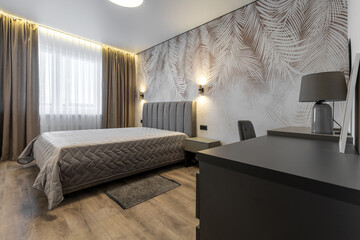 Modern Palm-Leaf Accent Bedroom with Desk