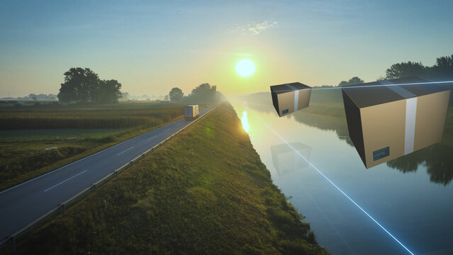 Aerial view of a truck at sunrise with 3D graphic overlay of packages, representing transport and delivery