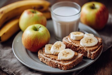 Healthy breakfast with whole wheat toast, peanut butter, banana, and apples