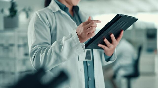 Laboratory, hands and scientist with tablet for reading, investigate and scroll report for medical. Healthcare, person and doctor with digital for online study, information and research for typing