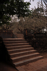 Staircases leading to courtyard of Mausoleum of Emperor Tu Duc in Hue, Vietnam.e