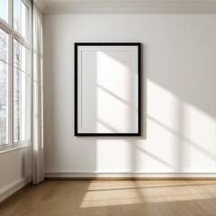 Empty white framed picture on a wall in a sunlit room