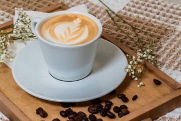 Cafe-Style Latte with Flower Decoration on Rustic Table
