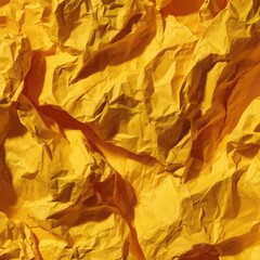 Close-up of crumpled, vibrant yellow paper