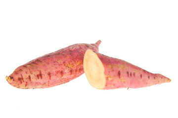 Ripe sweet potatoes on a white background