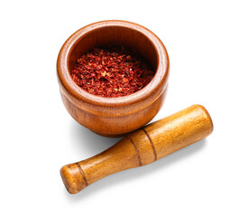 Wooden mortar and pestle with spices isolated on white background