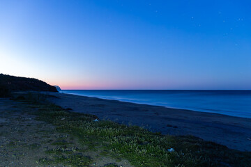 sunrise on the beach at the Mediterranean and stars
