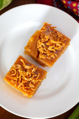 Thai mung bean custard or Thai custard cake on the wooden table.
