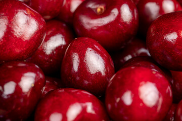 ripe red cherry berries , red cherry fruits on the kitchen table
