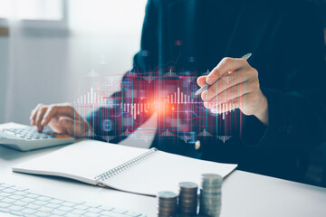 Person use laptop system Trader with digital stock market growth graph with trading data. invest in trading. planning and strategy. Stock market, Foreign exchange trading and forex trading