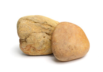 Fototapeta premium Pebbles with scratches and patterns are isolated on a white background. clipping path