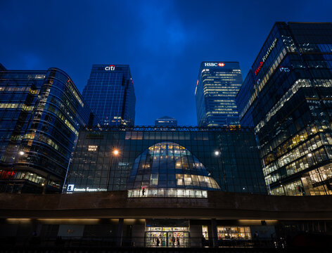 Canary Wharf, London, UK - Sep 20 2023: View of Canary Wharf in the evening seen from Churchill Place Shopping Mall looking towards Canada Square. Citibank, HSBC and Fitch Ratings buildings.