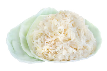 Sauerkraut and cabbage leaves isolated on white background