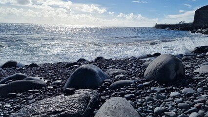 madeira beach with black pebbles volcanic geology