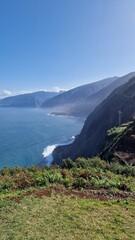 The coastal cliffs of Madeira Island offer breathtaking lookouts overlooking the vast Atlantic Ocean, where rugged rock formations meet endless blue waters. These viewpoints provide visitors with stun