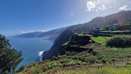 The coastal cliffs of Madeira Island offer breathtaking lookouts overlooking the vast Atlantic Ocean, where rugged rock formations meet endless blue waters. These viewpoints provide visitors with stun
