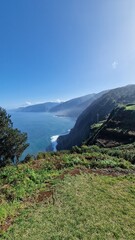 The coastal cliffs of Madeira Island offer breathtaking lookouts overlooking the vast Atlantic Ocean, where rugged rock formations meet endless blue waters. These viewpoints provide visitors with stun