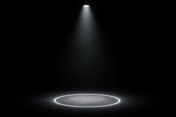 A light shining on a black surface.