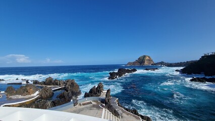 The Natural Pools of Porto Moniz, formed by ancient volcanic rocks, are the signature attraction of this charming coastal town in Madeira. These crystal-clear pools are naturally filled with fresh sea