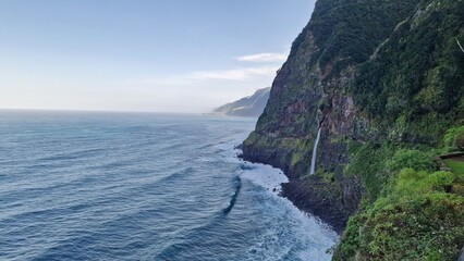 The Véu da Noiva viewpoint allows you to admire this abundant waterfall that erupts from the vegetation-covered slope, falling towards the sea.