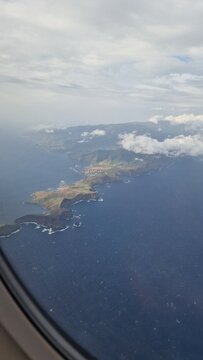 Fototapeta Ponta de São Lourenço is the easternmost point of the island of Madeira. It is inside the town of Caniçal and forms a part of the municipality of Machico. seen from airplane window